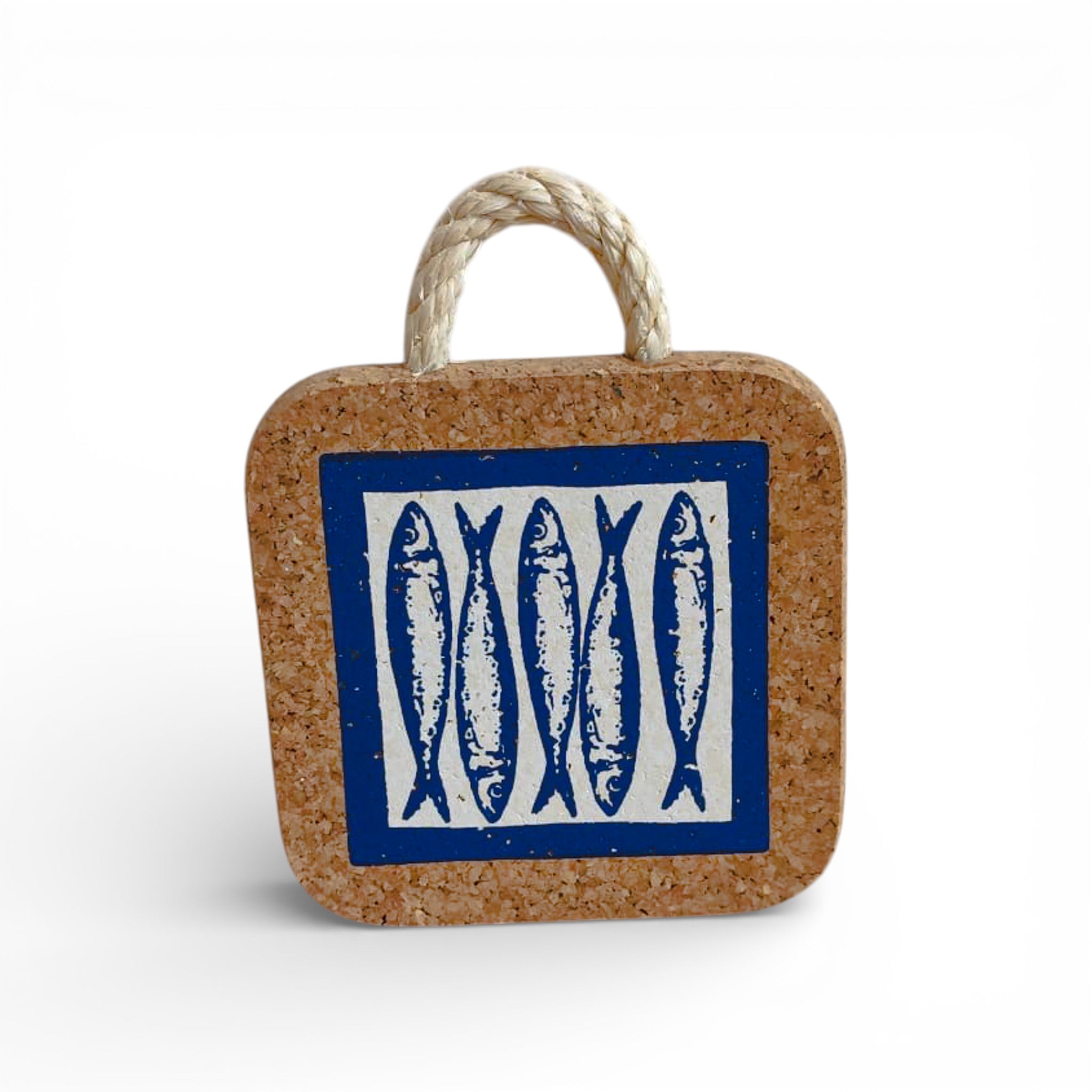 Viking blue sardine design on artisanal cork trivet, adding charm to kitchen decor.