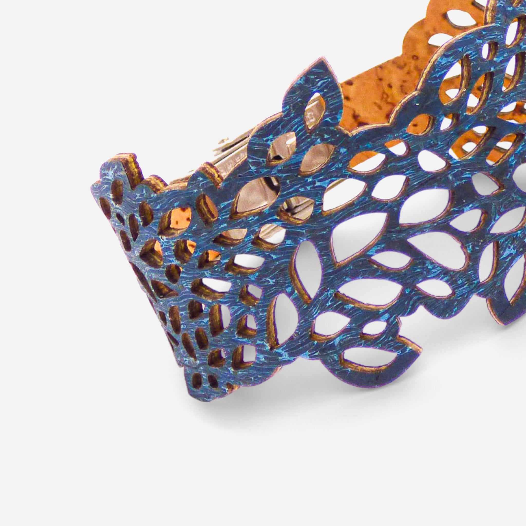 Blue lace-patterned cork bracelet for women by Cork Colors, showcasing intricate leaf motifs in a stylish design.