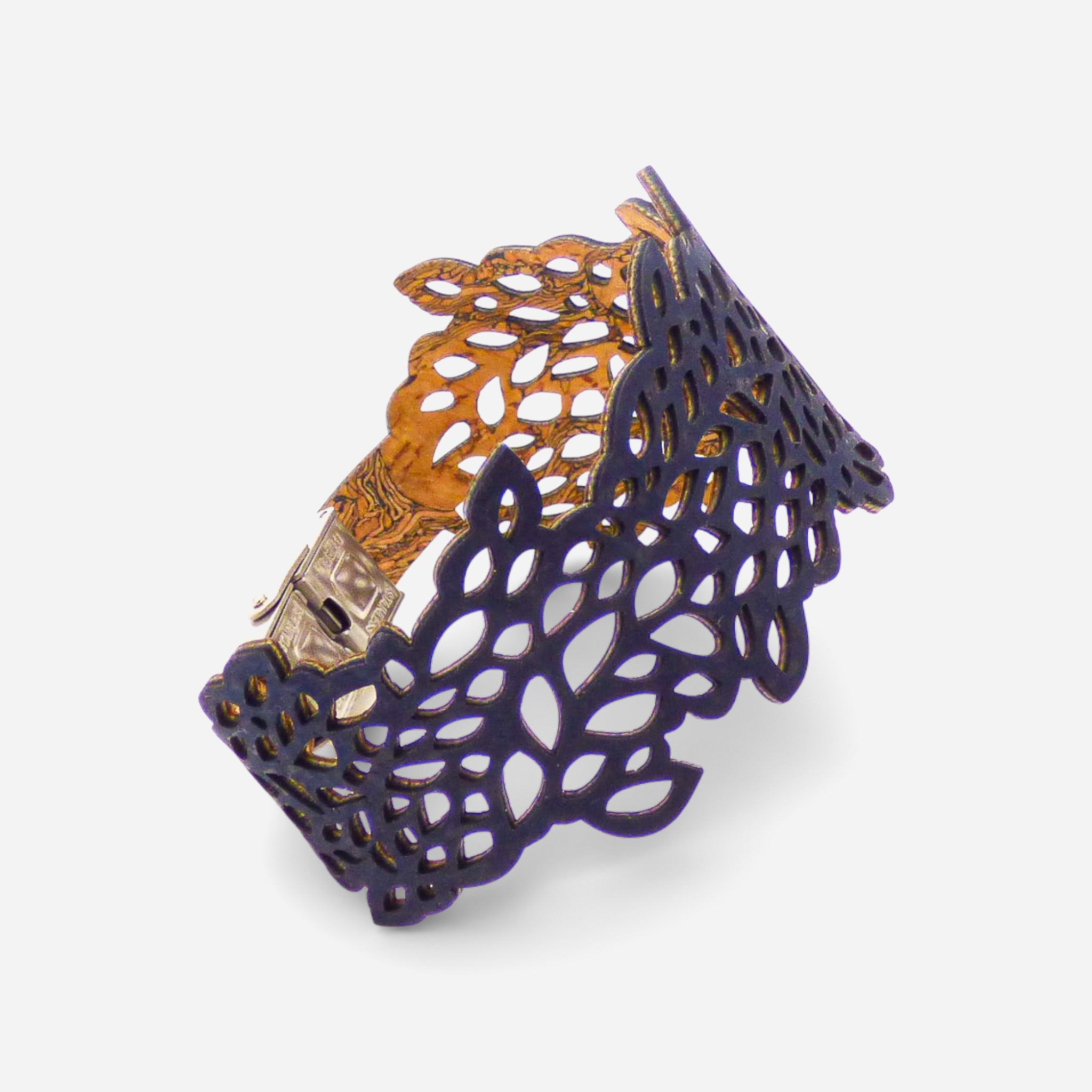 Black leafy cut-out design on a women's cork bracelet by Cork Colors, showcasing an elegant manchette style.