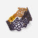 Black and gold lace leaf design women's cork bracelet by Cork Colors, showcasing intricate cut-out patterns.