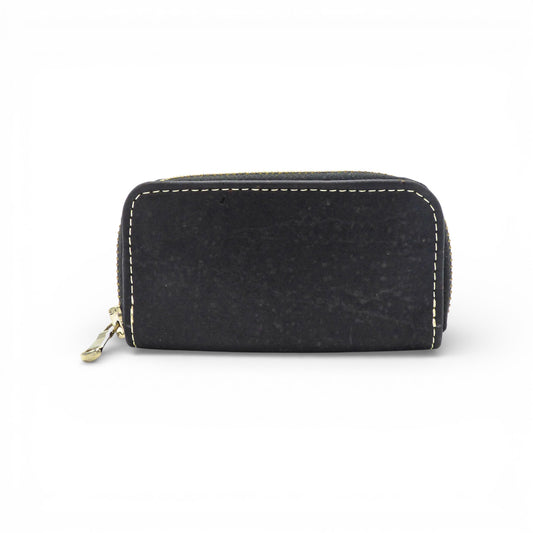 Compact Marla Pais wallet in black, featuring a sleek design and essential accessory style for everyday use.