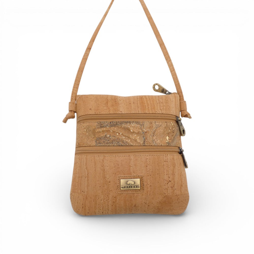 Compact cork shoulder pouch "Bandeau" by Montado in natural and gold tones, showcasing a trendy design and texture.