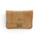 Accessoire de poche beige brut, détail texture granuleuse liège