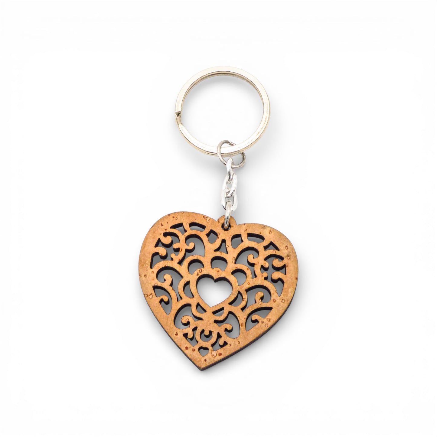 Natural cork heart keychain by Cork Colors with solar motif, showcasing a unique texture and eco-friendly design.