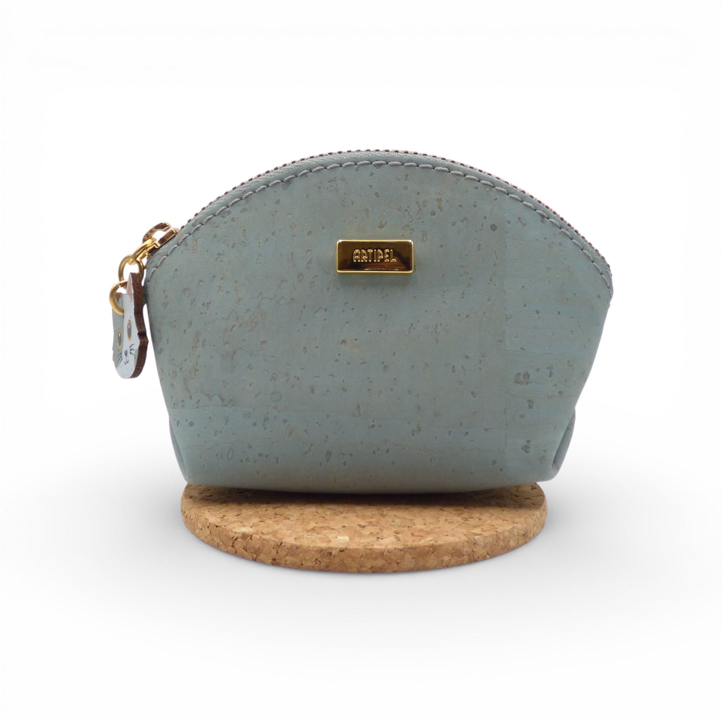Blue "Petit Chat d'Amour" coin purse by Artipel featuring a cat charm on the front.