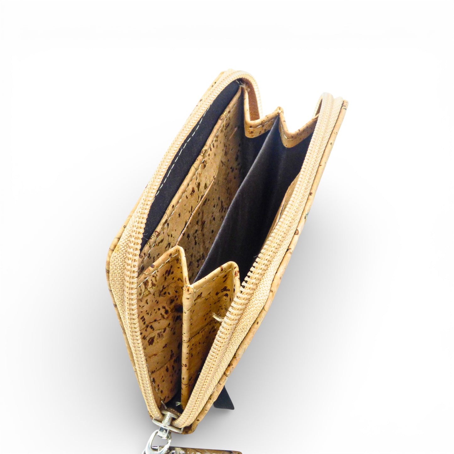 Compact zippered wallet in cork design by Cork Design, showcasing its eco-friendly and durable features.