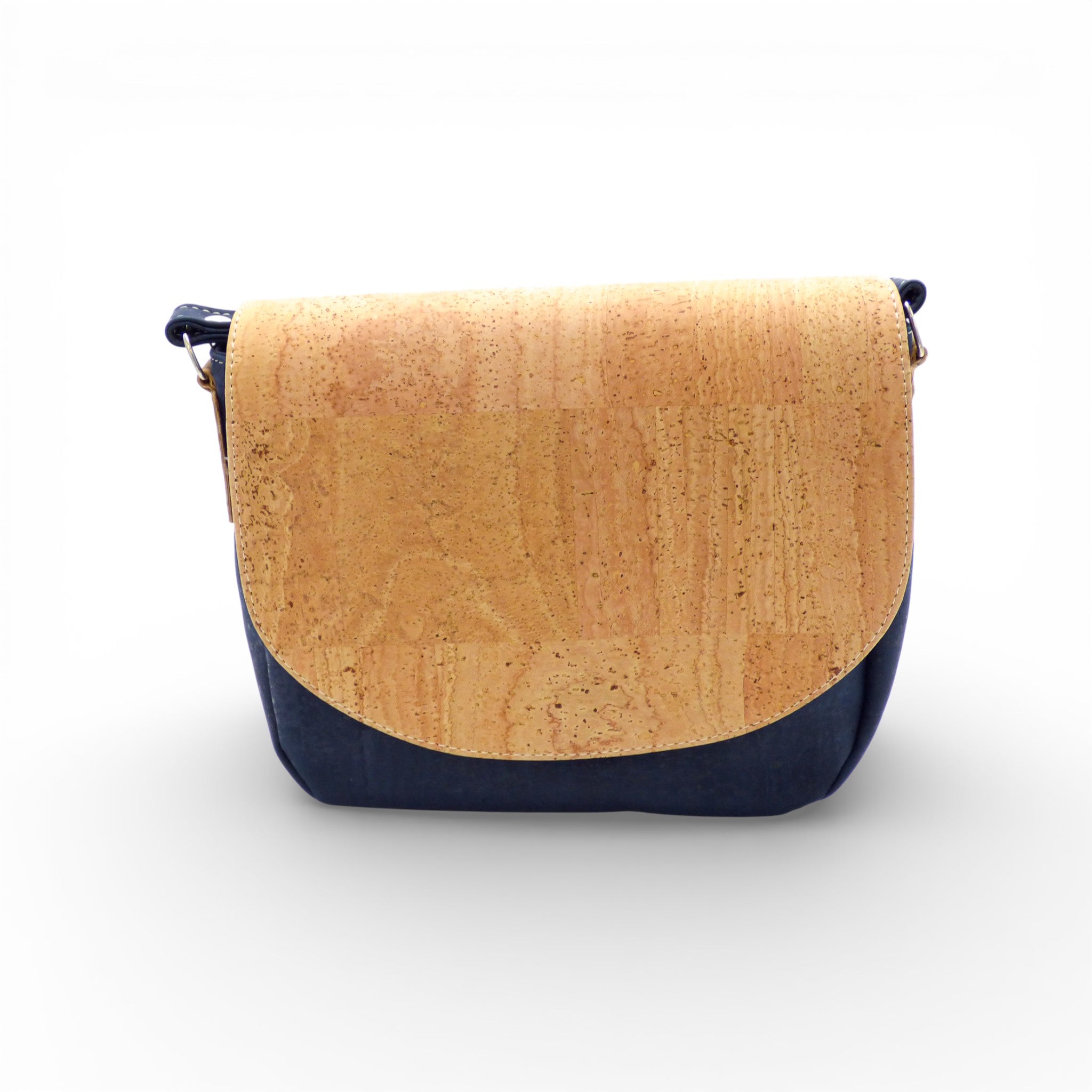 Bicolore "Grand Rabat" shoulder bag by Amador Varum, featuring a natural cork body and dark blue accents.
