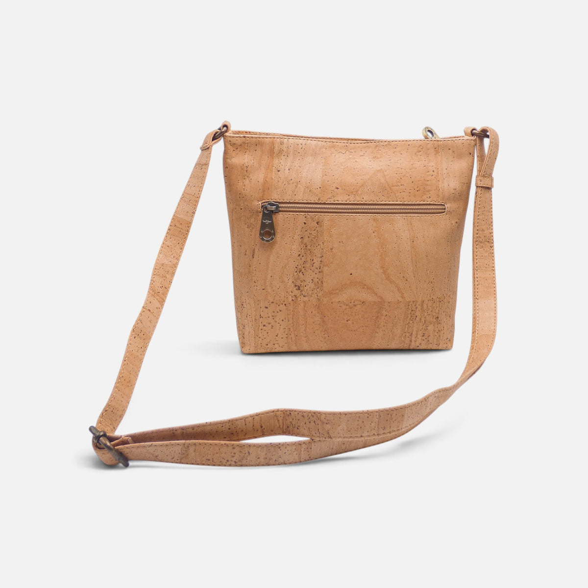 Dos d'un sac épaule en liège naturel, poche zippée et bandoulière longue
