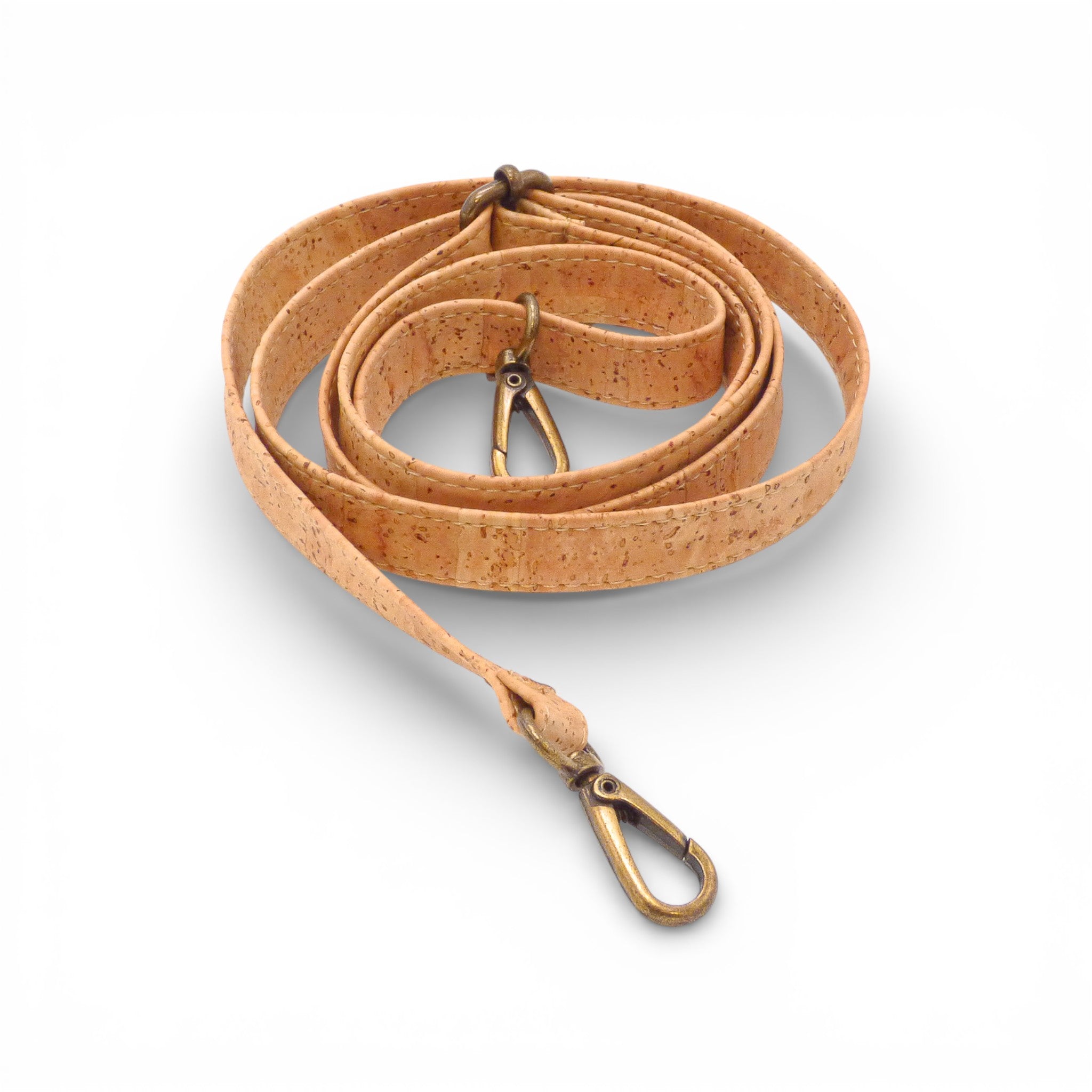 Detail view of Montado trendy cork bag handle showcasing unique texture and design elements.